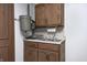 Garage features a sink area with storage cabinets for projects and clean-up at 3753 Whippoorwill Lake S Dr, Monrovia, IN 46157