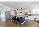 Open kitchen featuring a large island, stainless steel appliances, and custom cabinetry at 419 Dovetree Dr, Danville, IN 46122