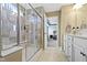 Beautiful main bathroom with a glass-enclosed shower and stylish vanity at 419 Dovetree Dr, Danville, IN 46122