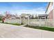 Backyard featuring a white fence and a charming arbor at 442 Athens Pl, Westfield, IN 46074