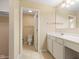 Clean bathroom featuring a white vanity with a sink, a toilet, and a walk-in shower in the background at 442 Athens Pl, Westfield, IN 46074