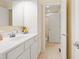 Bright bathroom featuring white cabinets, a vanity, and a separate toilet room with a shower-tub combo at 442 Athens Pl, Westfield, IN 46074