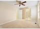 Large bedroom with multiple doors leading to other rooms, and a ceiling fan at 442 Athens Pl, Westfield, IN 46074