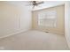 Neutral bedroom with a ceiling fan, a window with blinds, and wall-to-wall carpeting at 442 Athens Pl, Westfield, IN 46074