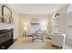 Cozy living room featuring a fireplace, comfortable seating, and abundant natural light at 442 Athens Pl, Westfield, IN 46074