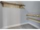 Angled closet featuring a hanging bar and two shelves for storage and organization at 451 N Gray St, Indianapolis, IN 46201