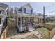 Beautiful home showcasing a classic design, inviting front porch, and a well-maintained lawn at 451 N Gray St, Indianapolis, IN 46201