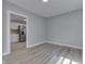 Cozy living room with a view of the stainless steel kitchen appliances at 451 N Gray St, Indianapolis, IN 46201