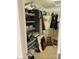 Walk-in closet featuring shelving, clothing racks, and ample space for storage at 4871 Franklin Villas Dr, Indianapolis, IN 46237