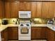 Well-equipped kitchen with modern appliances, ample counter space, and stylish cabinets at 4871 Franklin Villas Dr, Indianapolis, IN 46237