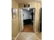 View from the hallway into a living room with a futon and a glimpse of its decor at 4871 Franklin Villas Dr, Indianapolis, IN 46237