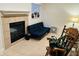 Charming living room with a fireplace and cozy seating, creating a relaxing atmosphere at 4871 Franklin Villas Dr, Indianapolis, IN 46237