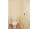 Bathroom featuring toilet and pink tile floor at 4959 Clarkson Dr, Indianapolis, IN 46254