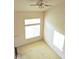 Spacious bedroom with neutral walls, large windows, ceiling fan, and carpet, perfect for relaxation at 4959 Clarkson Dr, Indianapolis, IN 46254