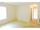 Bright bedroom with window, carpeted floors, and neutral walls at 4959 Clarkson Dr, Indianapolis, IN 46254