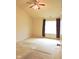 Spacious bedroom with a large window, closet, and ceiling fan at 4959 Clarkson Dr, Indianapolis, IN 46254
