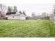 Extensive backyard area with a detached garage and fenced perimeter at 504 W Dwain, Shelbyville, IN 46176