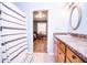 Well-lit bathroom showing vanity and shower, seen from an open doorway to bedroom at 504 W Dwain, Shelbyville, IN 46176