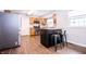 Well-equipped kitchen with stainless steel appliances, wooden cabinets, and a breakfast bar at 504 W Dwain, Shelbyville, IN 46176