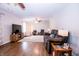 Bright living room with hardwood floors, a comfortable sofa, and a decorative area rug at 504 W Dwain, Shelbyville, IN 46176