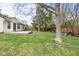 Spacious backyard with a concrete patio, ideal for outdoor relaxation and entertainment at 5105 Hawks Crescent Ct, Indianapolis, IN 46254