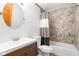Updated bathroom showcasing modern vanity, fixtures, and shower at 5105 Hawks Crescent Ct, Indianapolis, IN 46254