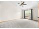 Large main bedroom features vaulted ceiling, large window, and neutral carpeting at 5105 Hawks Crescent Ct, Indianapolis, IN 46254
