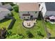 Aerial view of the home showcasing the backyard, patio, and surrounding landscape at 518 Carthage Cir, Westfield, IN 46074
