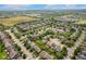 Aerial view of a quiet neighborhood with mature trees and green spaces at 518 Carthage Cir, Westfield, IN 46074