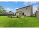 Expansive backyard with patio, perfect for outdoor entertaining and enjoying the serene surroundings at 518 Carthage Cir, Westfield, IN 46074