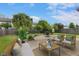 Backyard patio with outdoor furniture, offering a relaxing space for entertaining and enjoying the outdoors at 518 Carthage Cir, Westfield, IN 46074