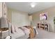 Inviting bedroom with a plush bed, natural light, and closet storage at 518 Carthage Cir, Westfield, IN 46074