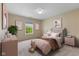 Charming bedroom featuring a single bed, window, and playful decor, perfect for a  at 518 Carthage Cir, Westfield, IN 46074