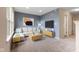 Comfortable living room with modern decor, plush carpet, and a large window at 518 Carthage Cir, Westfield, IN 46074