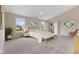 A bright and airy primary bedroom features carpet, with natural light and views at 518 Carthage Cir, Westfield, IN 46074