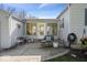 Charming backyard patio with comfortable seating perfect for enjoying outdoor living and entertaining guests at 5277 Kingsley Dr, Indianapolis, IN 46220