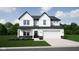 Charming two-story home with white siding, black accents, and a well-manicured lawn at 5692 Coulter Way, Greenwood, IN 46143