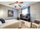 Comfortable bedroom with soft lighting, artwork, and window views at 591 Scotch Pine Dr, Greenwood, IN 46143