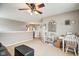 Upstairs bonus room area with neutral colors, a ceiling fan, and lots of light at 591 Scotch Pine Dr, Greenwood, IN 46143