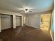 Spacious bedroom with hardwood floors and ample closet space, offering a comfortable and functional layout at 605 Queenswood Dr, Indianapolis, IN 46217