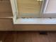 Window seat with storage, next to hardwood floors and a vent at 605 Queenswood Dr, Indianapolis, IN 46217
