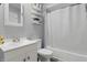 Clean bathroom with a shower and modern fixtures at 6303 Bertha St, Indianapolis, IN 46241
