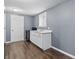 Functional kitchenette featuring essential appliances and a practical design at 6303 Bertha St, Indianapolis, IN 46241