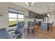 Sun-filled dining area adjacent to the kitchen offers a seamless flow for Gathering meals and gatherings at 6625 Ferguson Dr, Whitestown, IN 46075