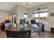 Sun-drenched dining area with large windows showcasing pleasant neighborhood views at 6625 Ferguson Dr, Whitestown, IN 46075