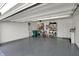 Spacious garage with ample storage and shelving units for organization at 6625 Ferguson Dr, Whitestown, IN 46075