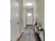 Inviting entryway with wood-look floors, neutral paint, and stylish console table with lamp at 6625 Ferguson Dr, Whitestown, IN 46075