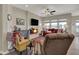 Spacious living room with large windows, comfortable seating, fireplace and stylish accents at 6625 Ferguson Dr, Whitestown, IN 46075