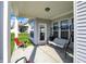 Covered patio with a porch swing, perfect for outdoor relaxation and seating at 6625 Ferguson Dr, Whitestown, IN 46075