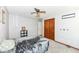 Bedroom with carpet, neutral paint, ceiling fan, and closet at 7145 Lafayette Rd, Indianapolis, IN 46278